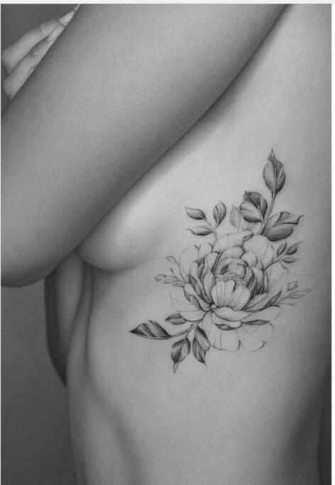 45 Charming and Irresistible Rib Tattoos Designs