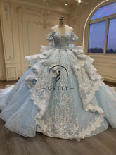 Ostty Blue Quinceañera Dress with Silver Lace and Layered Skirt OST-QN037-25 (Wholesale)