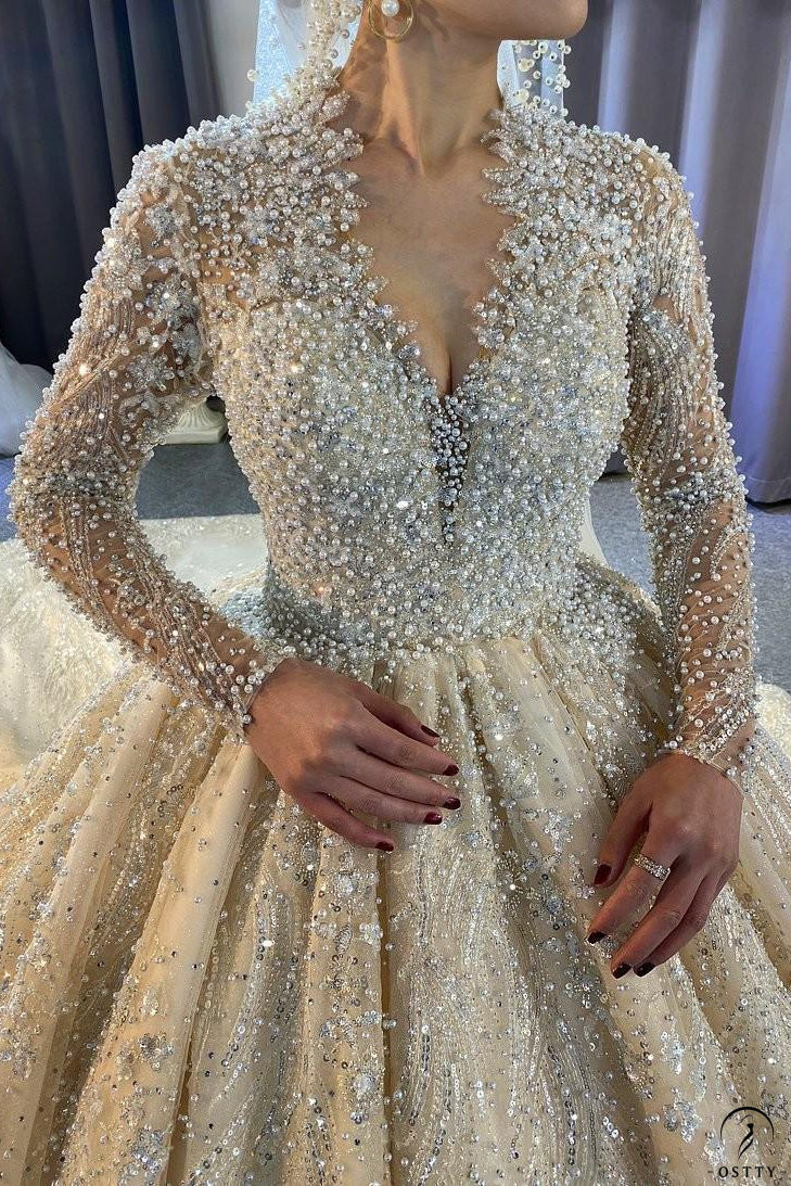 OSTTY - Luxury Long Sleeve V Neck beading Wedding Dress OS784 $1,399.99 OSTTY - Luxury Long Sleeve V Neck beading Wedding Dress OS784 $1,399.99