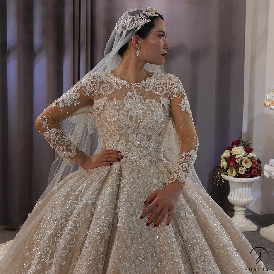 OSTTY - Luxury Round Neck Long Sleeves Full Beading Crystals Wedding Dress OS3917 $1,299.99 OSTTY - Luxury Round Neck Long Sleeves Full Beading Crystals Wedding Dress OS3917 $1,299.99