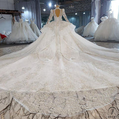 White Luxury Long Sleeve Wedding Dress With Train Pearl Sequins Lace High Waist Ball Gown OSA081901 - $1,299.99
