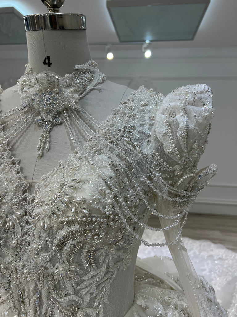 Choosing Ostty to create your custom wedding dress.