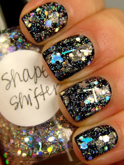 99+ Trending Black Nails Art Manicure Ideas; Black coffin nails; Black acrylic nails; long Black gel nail; short Black nails; Black cute nails; Black matte nails; Black glitter nails.