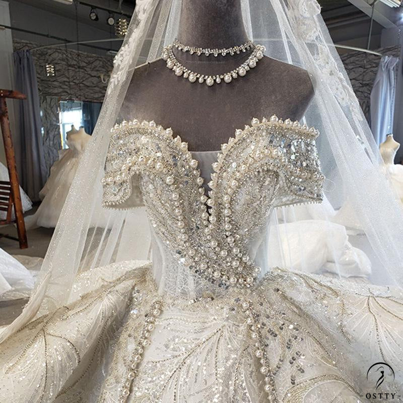 OSTTY - Beads Lace off-Shoulder Wedding Dress with Large Train Ball Gown OSA0828 $1,199.99 OSTTY - Beads Lace off-Shoulder Wedding Dress with Large Train Ball Gown OSA0828 $1,199.99