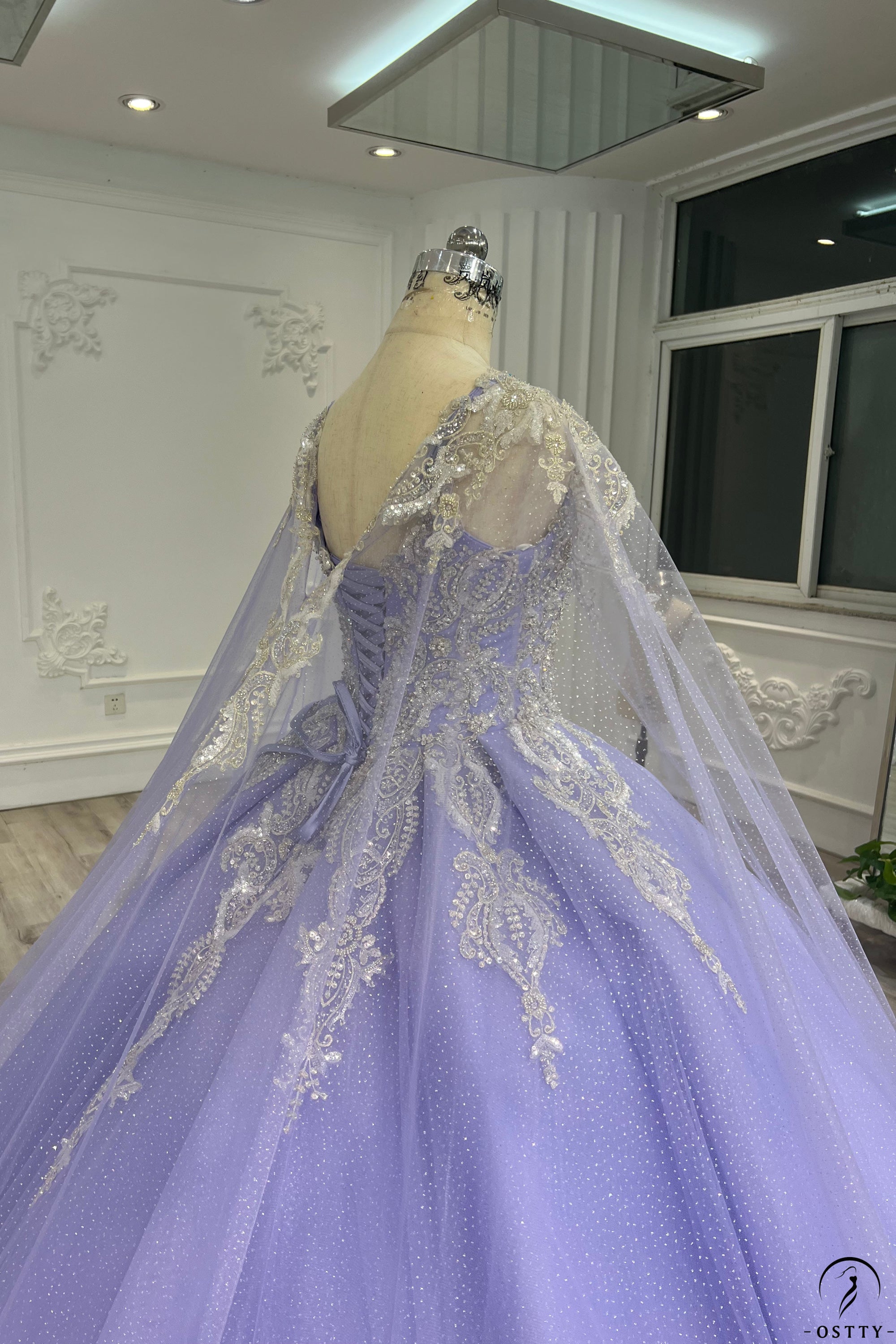 OSTTY - Lilac Cape Quinceanera Dress OS731 $849.99 OSTTY - Lilac Cape Quinceanera Dress OS731 $849.99