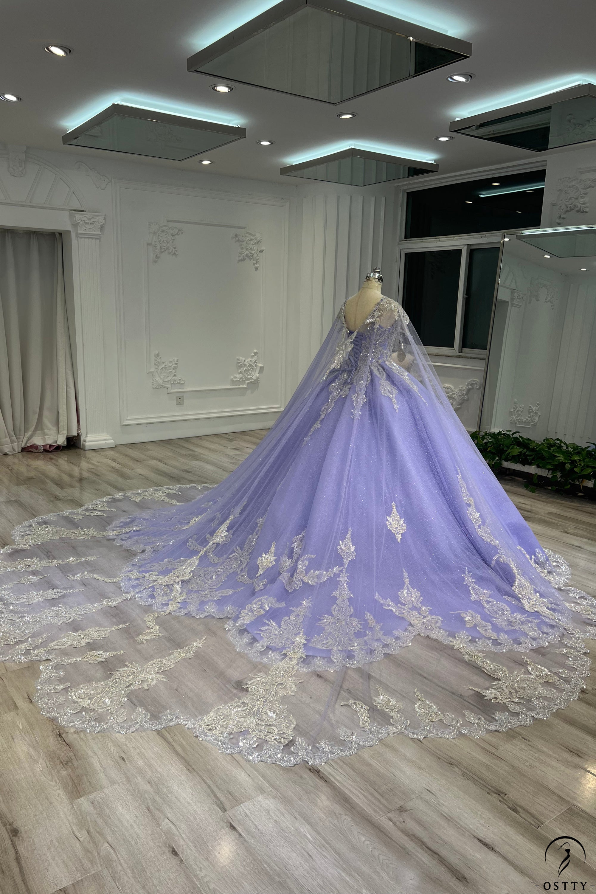 OSTTY - Lilac Cape Quinceanera Dress OS731 $849.99 OSTTY - Lilac Cape Quinceanera Dress OS731 $849.99