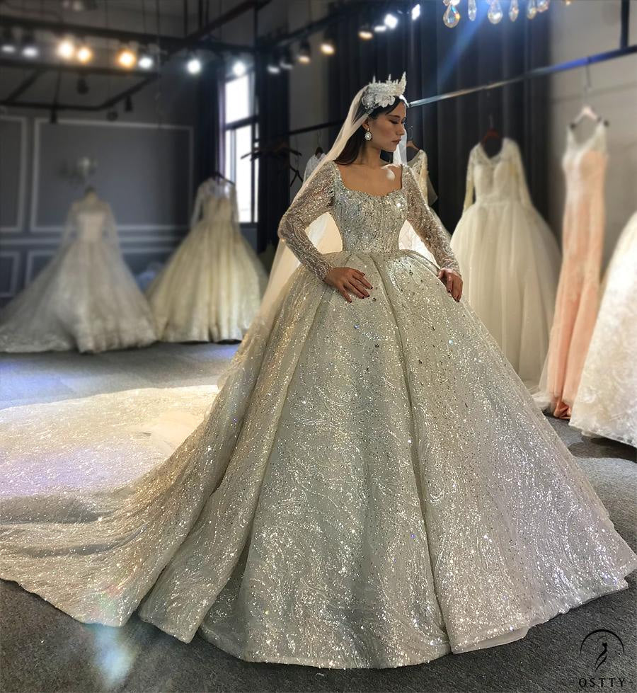 OSTTY - Luxury White Wedding Dress Long Sleeve Full Beading Ball Gown $1,999.99 OSTTY - Luxury White Wedding Dress Long Sleeve Full Beading Ball Gown $1,999.99
