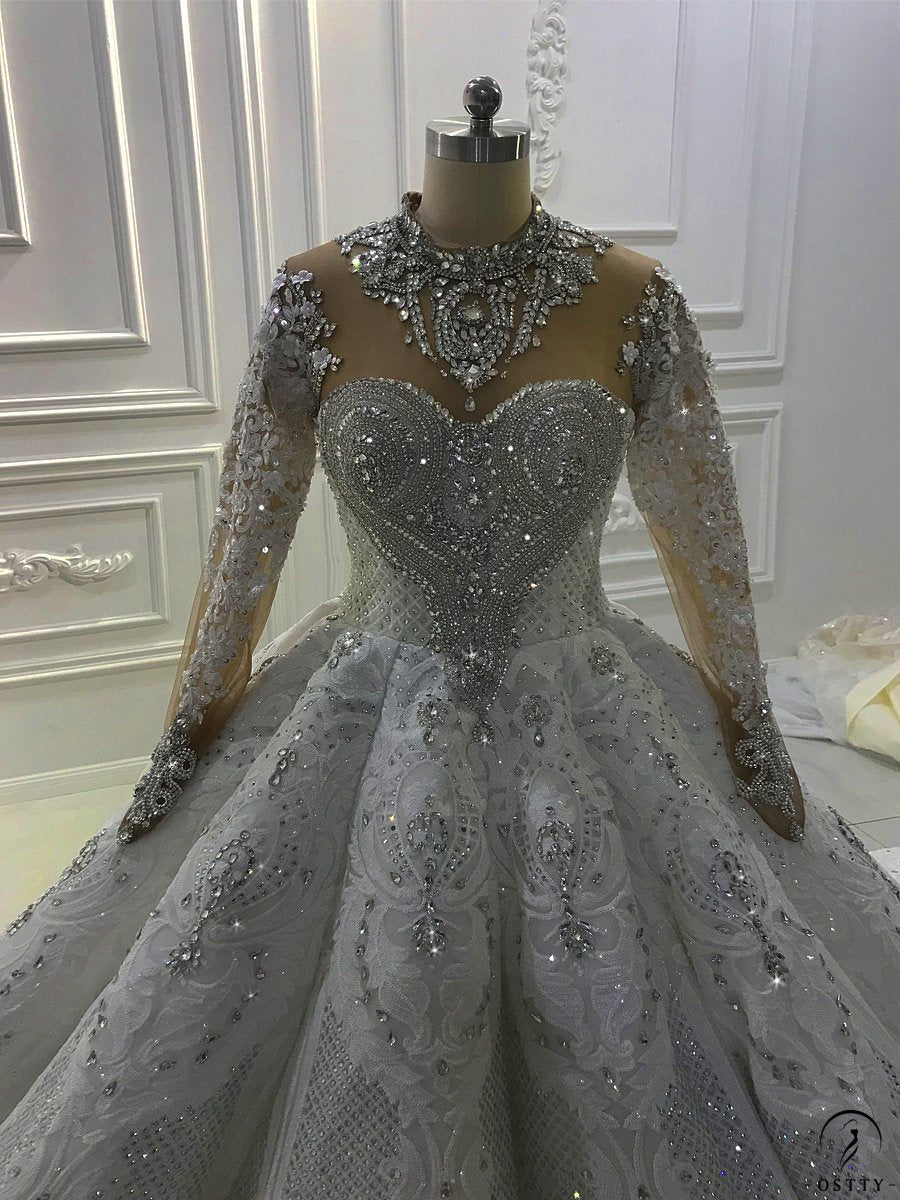 OSTTY - Luxury White Wedding Dress Long Sleeve High Neck Full Beading Ball Gown $1,399.99 OSTTY - Luxury White Wedding Dress Long Sleeve High Neck Full Beading Ball Gown $1,399.99