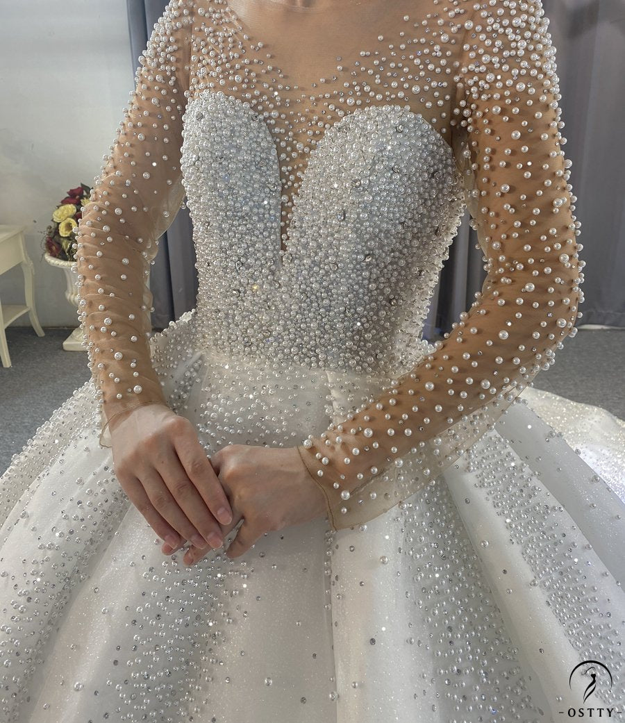 OSTTY - Luxury White Wedding Dress Long Sleeve V Neck Ball Gown Crystal Dresses OS4017 $1,299.99 OSTTY - Luxury White Wedding Dress Long Sleeve V Neck Ball Gown Crystal Dresses OS4017 $1,299.99