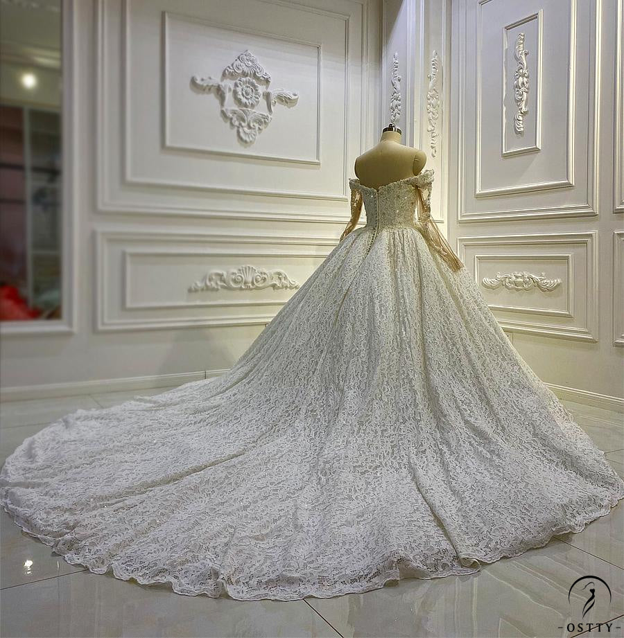 OSTTY - White One Shoulder Long Sleeves Full Beading Wedding Dress OS3935 $1,199.99 OSTTY - White One Shoulder Long Sleeves Full Beading Wedding Dress OS3935 $1,199.99